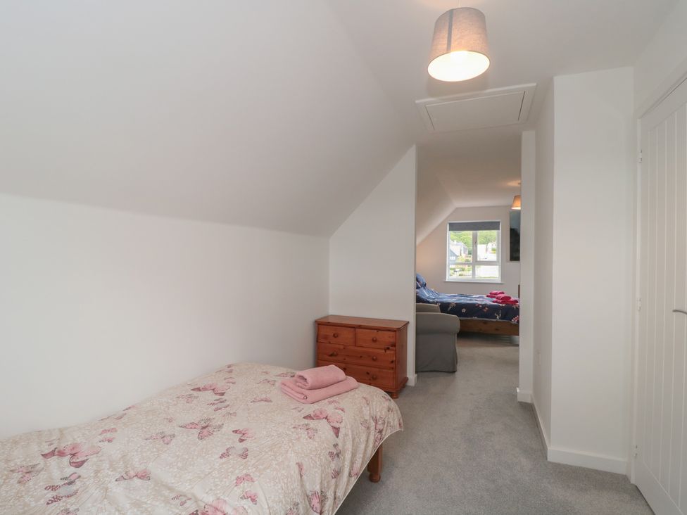 A bedroom with a bed and dresser at 56 Strothers Avenue Malvern
