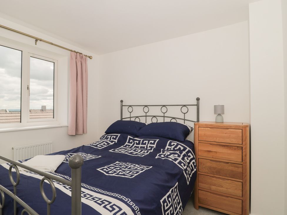 A bedroom with a bed and dresser at 56 Strothers Avenue Malvern