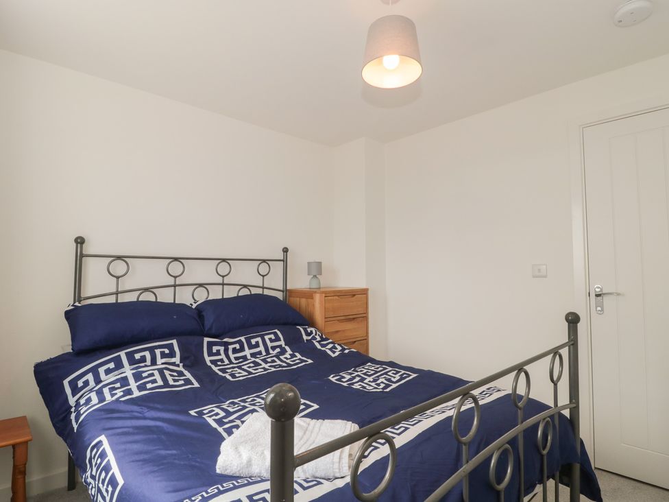 A bedroom with a bed and a dresser at 56 Strothers Avenue Malvern