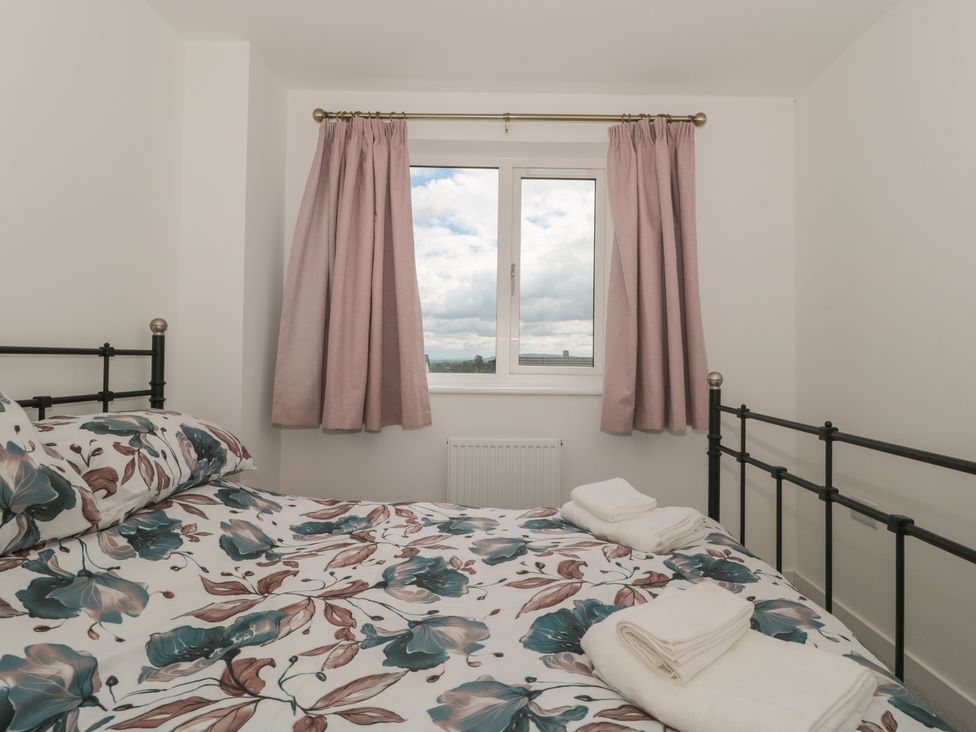 A bedroom with a bed and window at 56 Strothers Avenue Malvern