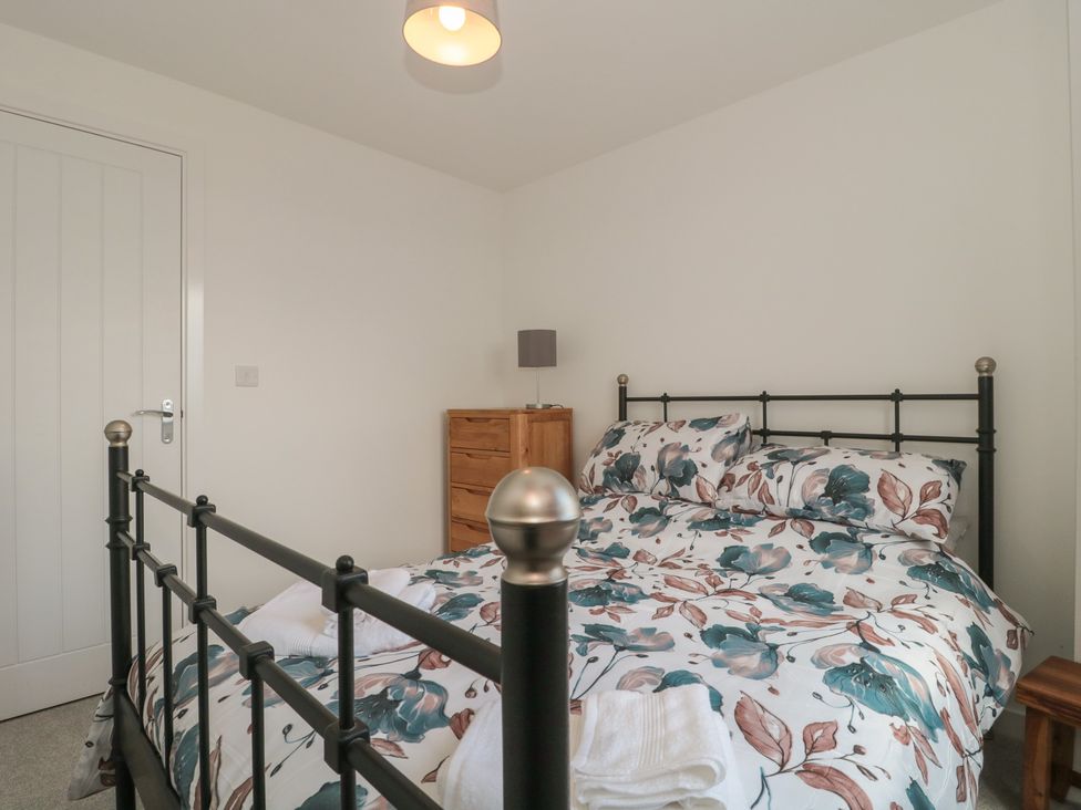 A bedroom with a bed and a drawer at 56 Strothers Avenue in Malvern
