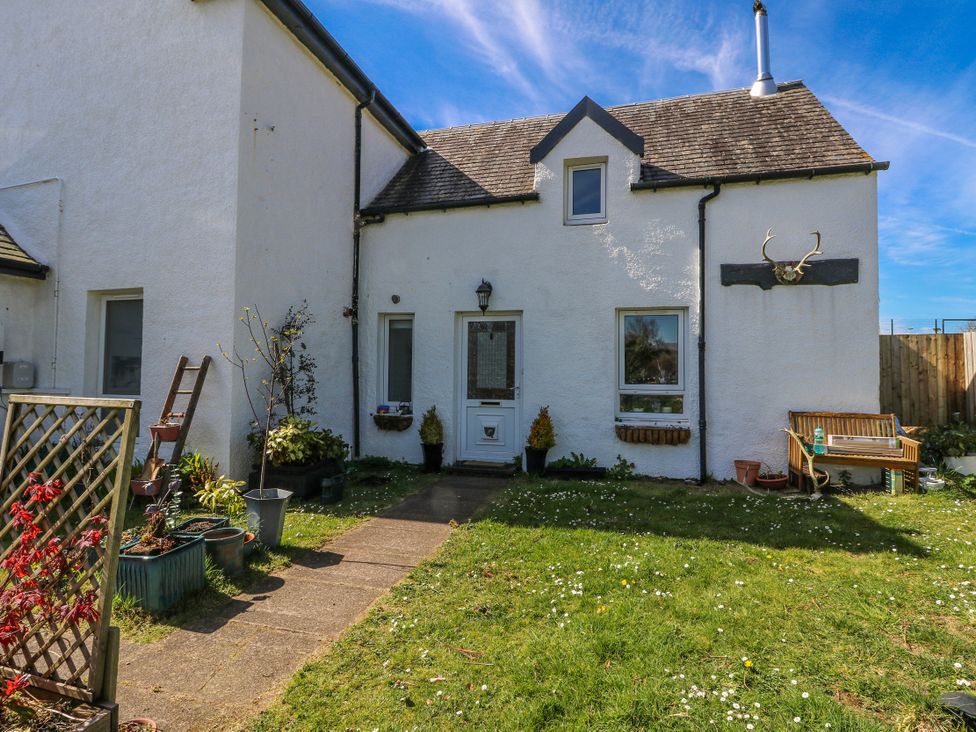 A house with a pathway and plants at Schoolhouse in Oban