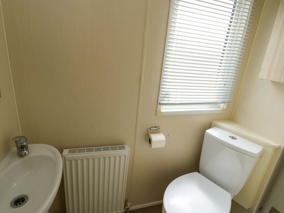 A bathroom with a sink and toilet at W629 Abergele