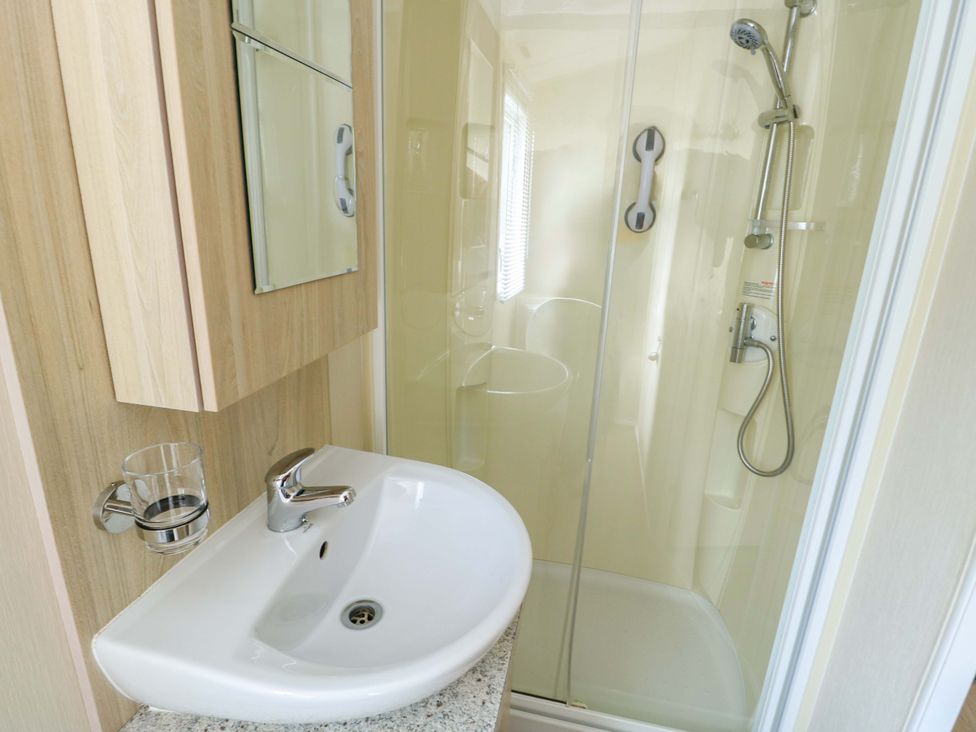 A bathroom with a sink and shower at W629 Abergele