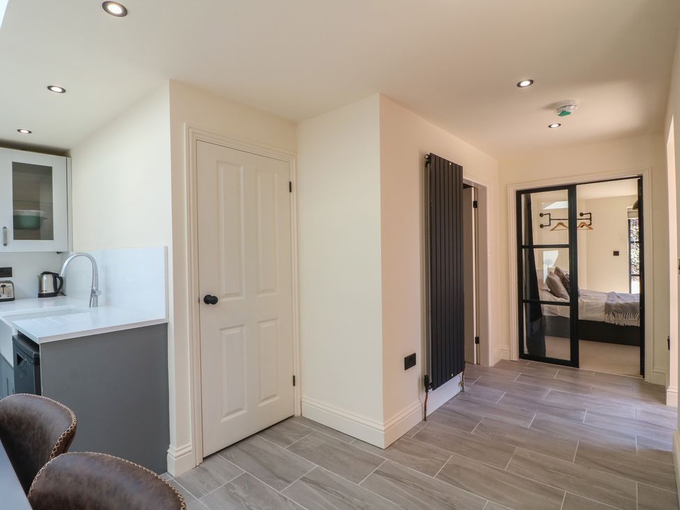 A kitchen with a sink and kettle at Gardener’s Cottage in Oakham