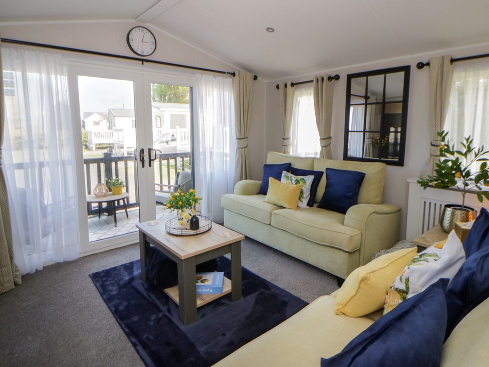 A living room with furniture and a view at Santa Maria in Llandysul