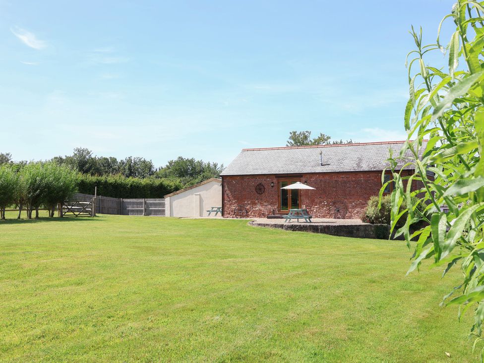 A barn and garden area at Little Owl Barn in Wellington