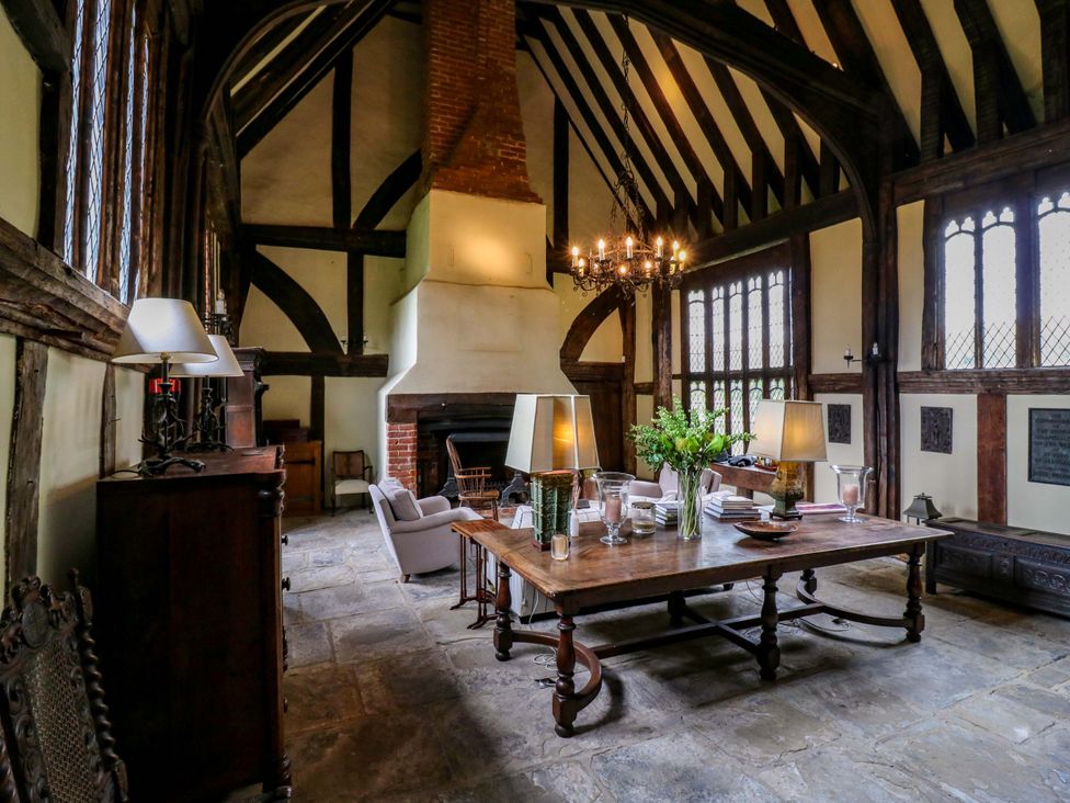 A dining room with a table and chairs at Dukes Place 