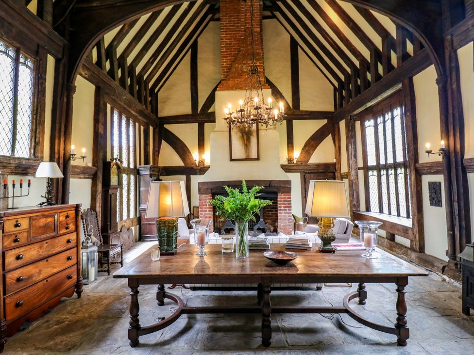 A living room with a wooden table and chairs at Dukes Place