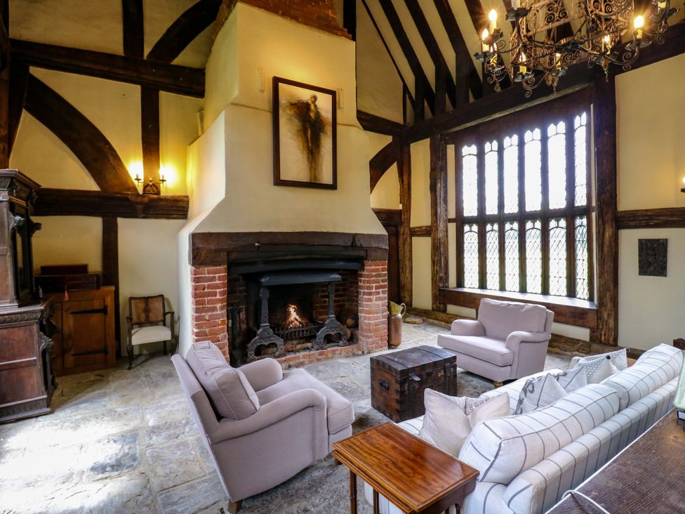 A living room featuring a fireplace and seating area at Dukes Place