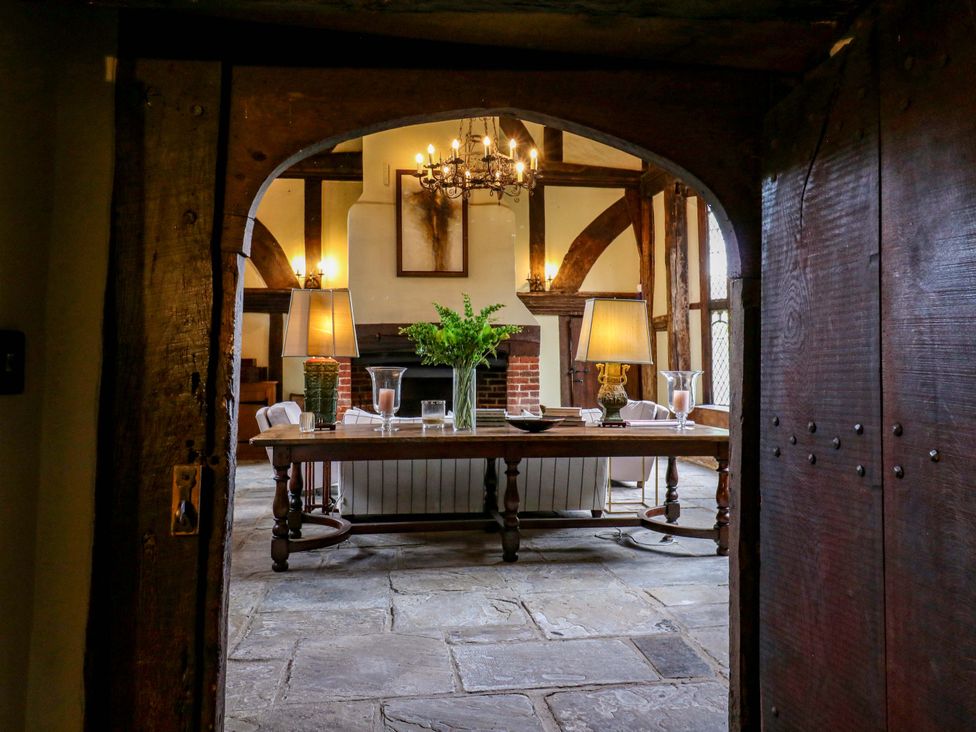 A dining room with a table and chairs at Dukes Place 