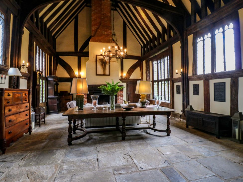 A dining room with a table and chairs at Dukes Place
