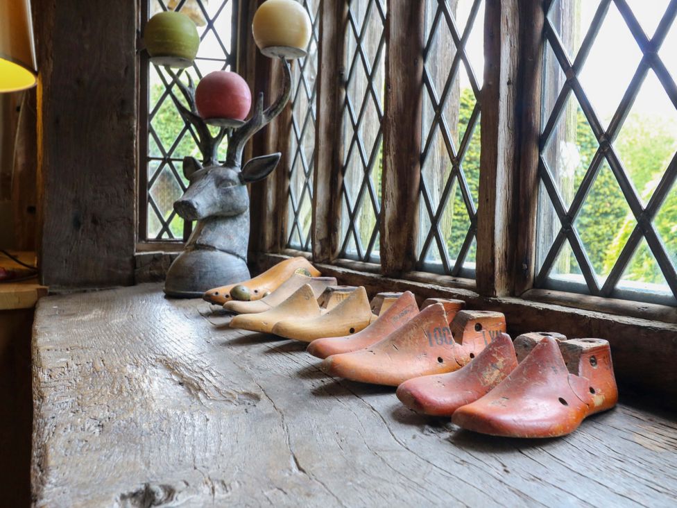 A display of wooden shoe lasts on a table at Dukes Place