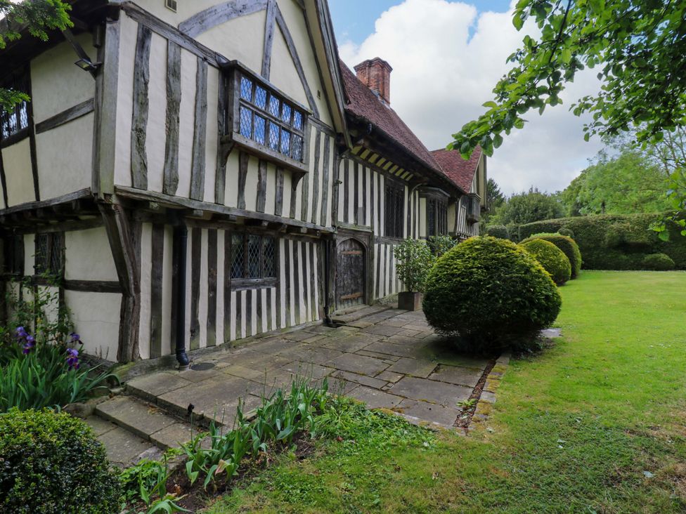 An exterior view of a traditional building with a garden at Dukes Place