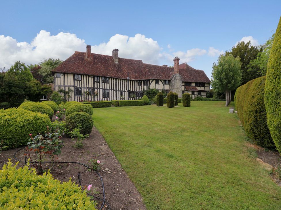 A house with garden and trees at Dukes Place