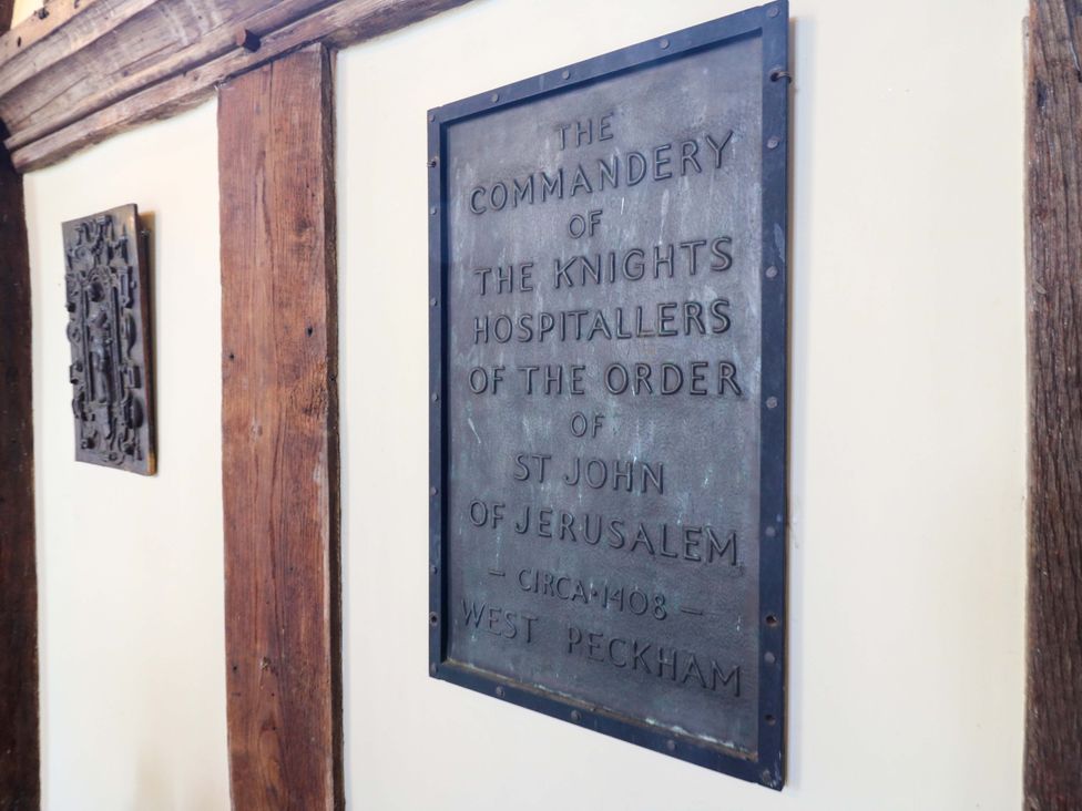 A plaque on a wall at Dukes Place