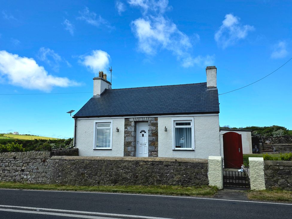 A house with a door and windows at Pant in Holyhead
