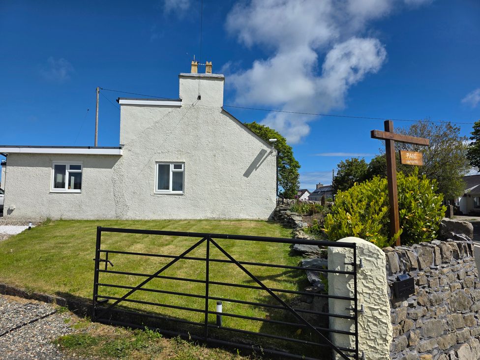 A house with a garden and gate at Pant in Holyhead