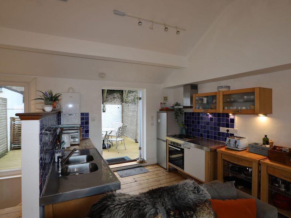 A kitchen with a sink and an oven at Dart Views in Dartmouth
