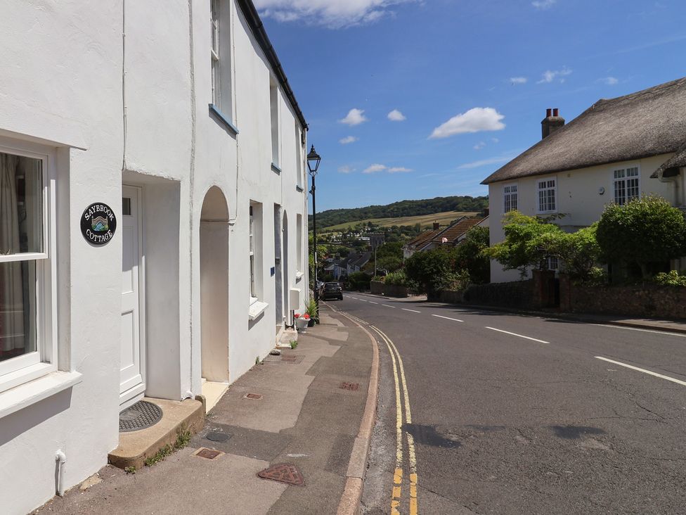 A street view featuring Saybrook Cottage in Charmouth