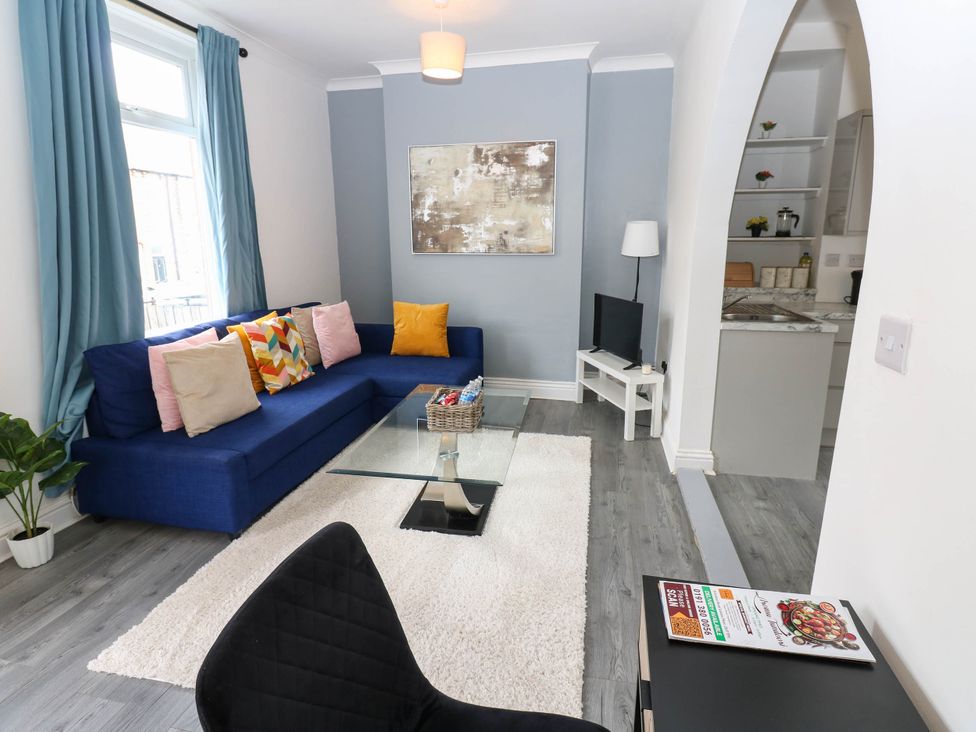 A living room with a sofa and coffee table at 22 Prospect Terrace in Brancepeth