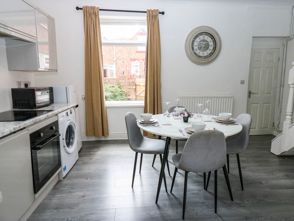 A dining room with a table and chairs at 22 Prospect Terrace in Brancepeth