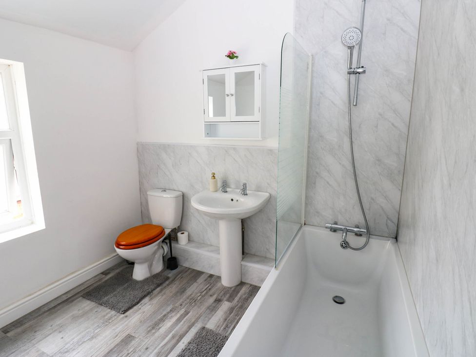 A bathroom with a toilet, sink, bathtub, and shower at 22 Prospect Terrace in Brancepeth