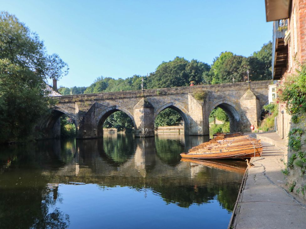 A bridge over water with boats moored along the pathway at 22 Prospect Terrace, Brancepeth