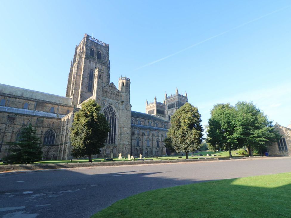 A cathedral with trees and a grassy area at 22 Prospect Terrace in Brancepeth