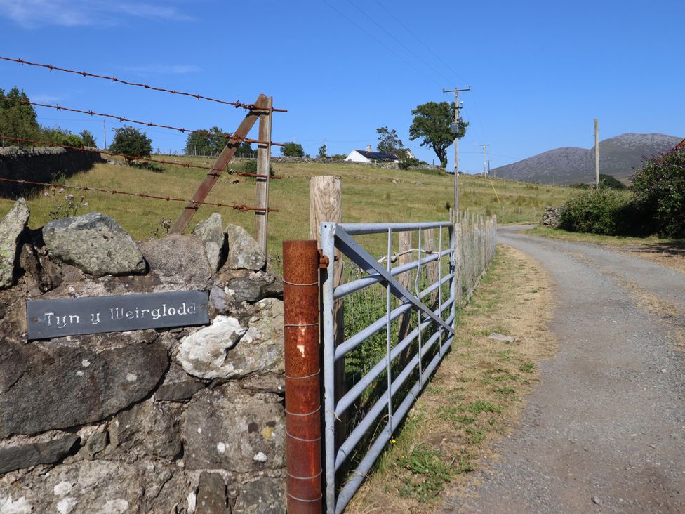 A gate leading to a path at Tyn Y Weirglodd in Deiniolen