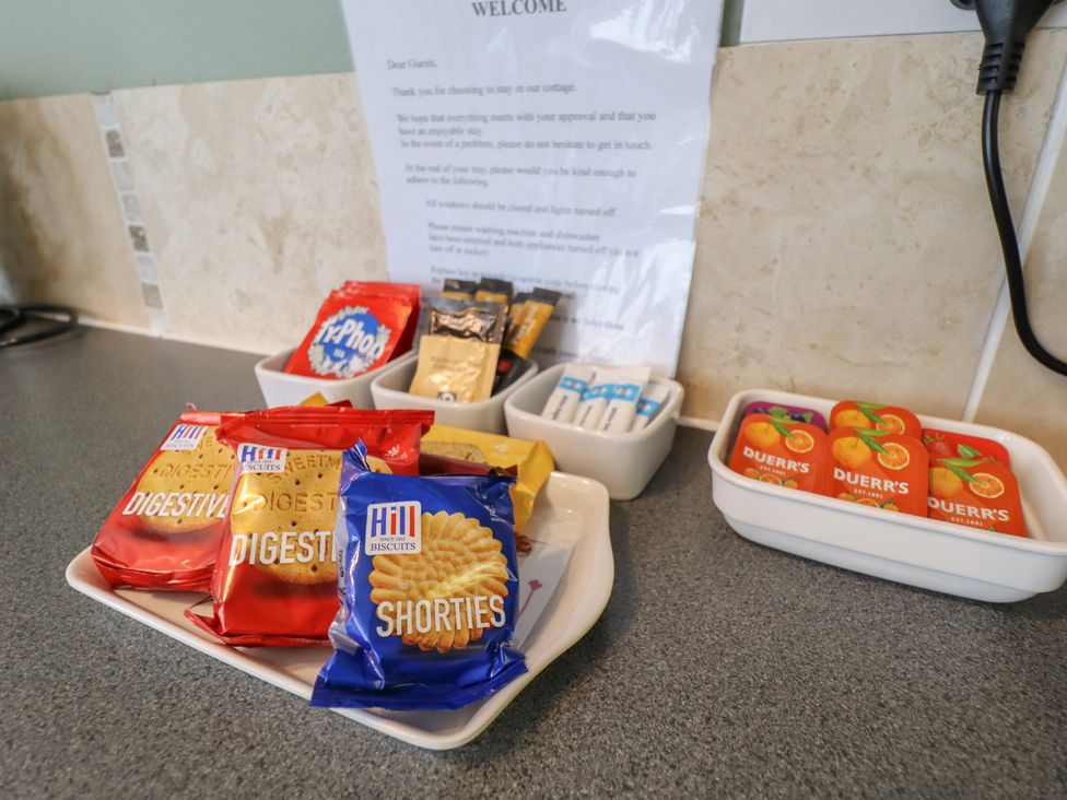 A selection of biscuits and condiments on a counter at Pankhurst Cottage in Louth