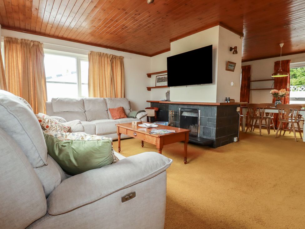 A living room with sofa and coffee table at 7 Chycoose Parc 