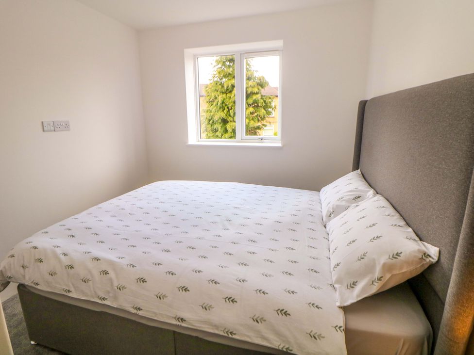 A bedroom with a bed and window at 49 Rushley Road in Sheffield