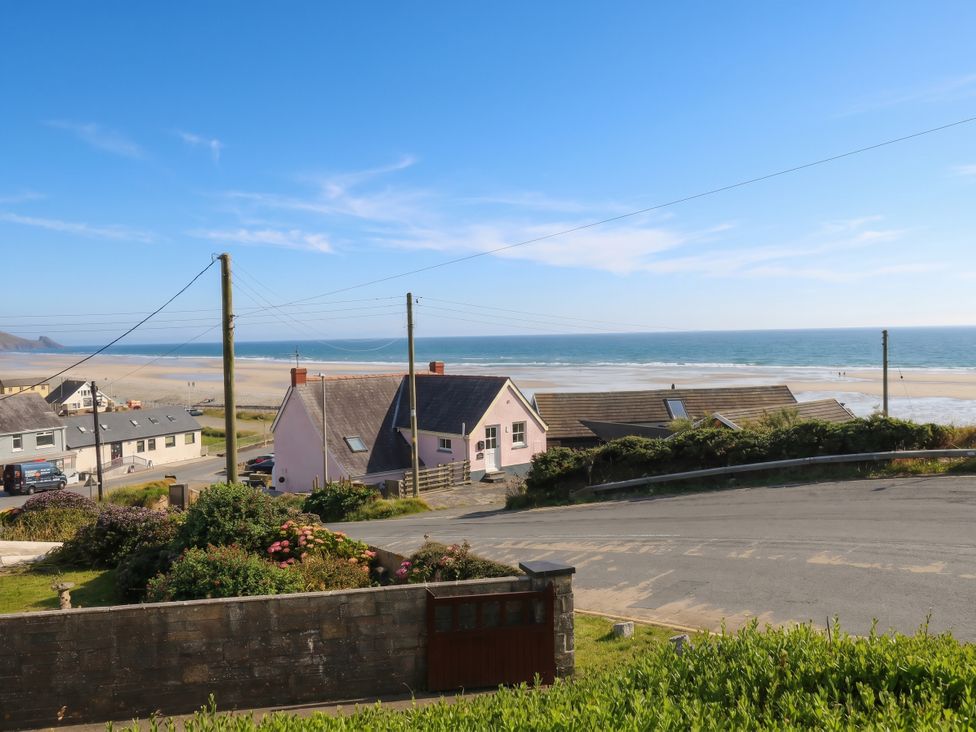 A view of houses and beach at Newgale Cottage in Newgale