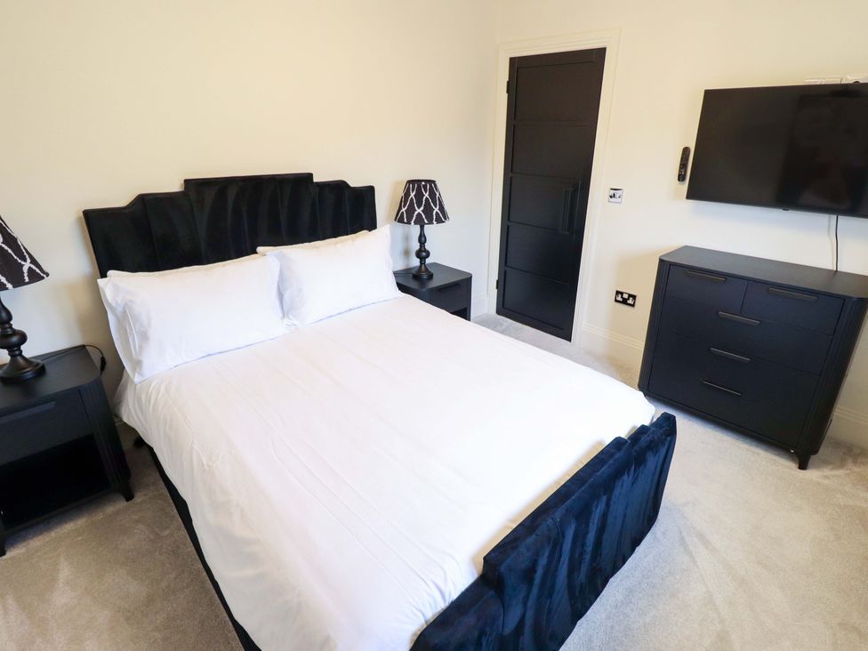 A bedroom with a bed and television at 21 Anderby road