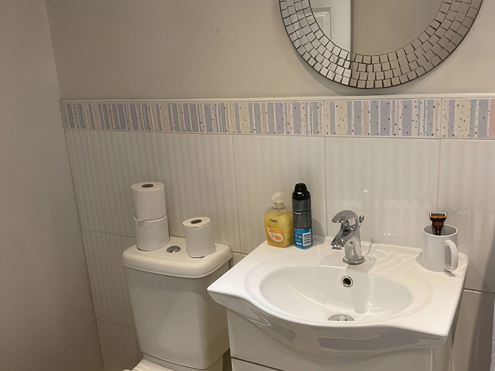 A bathroom with sink and toilet at The Cottage in Stokesley