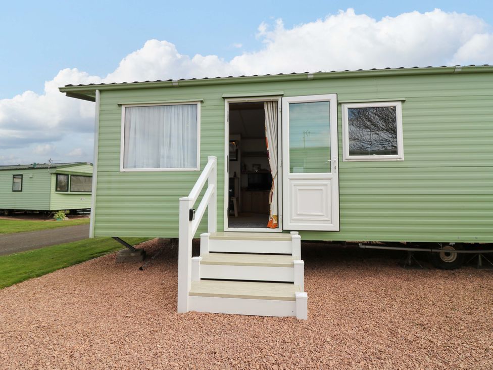 A mobile home with steps and a door at St Monans Holiday Park - Holiday Accommodation 19927, St Monans