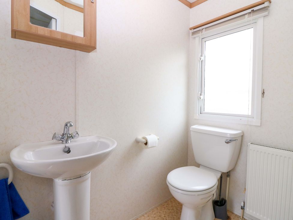 A bathroom with a sink and toilet at St Monans Holiday Park - Holiday Accommodation 19927, St Monans