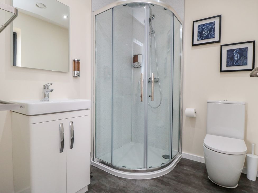 A bathroom featuring a sink, shower, and toilet at Bay View