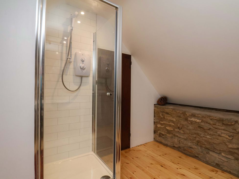A bathroom with a shower enclosure at The Gardener's Cottage, Low Hall Scarborough