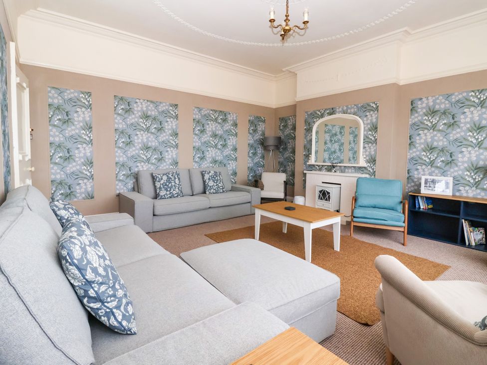 A living room with a sofa and coffee table at Sunrise Lodge in Bridlington