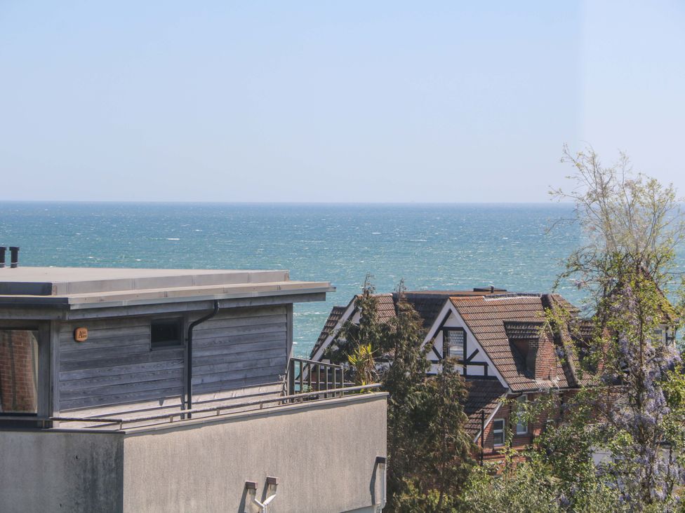 A view of the sea and nearby houses at Shoreline Retreat in Bournemouth