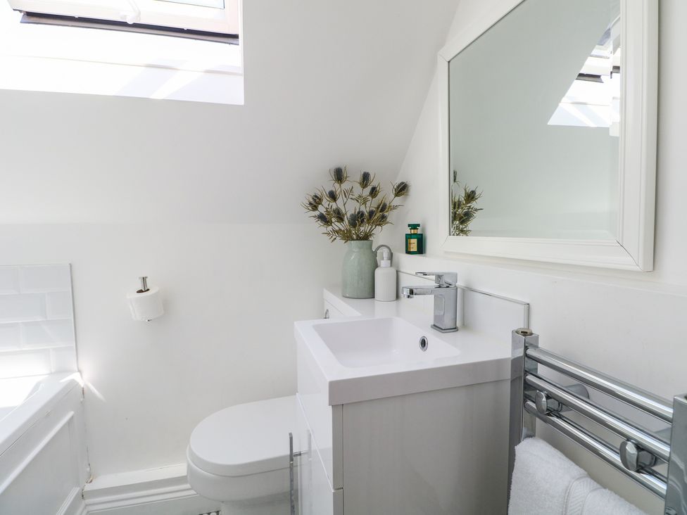 A bathroom with a sink and toilet at East Cliff Gardens in Folkestone