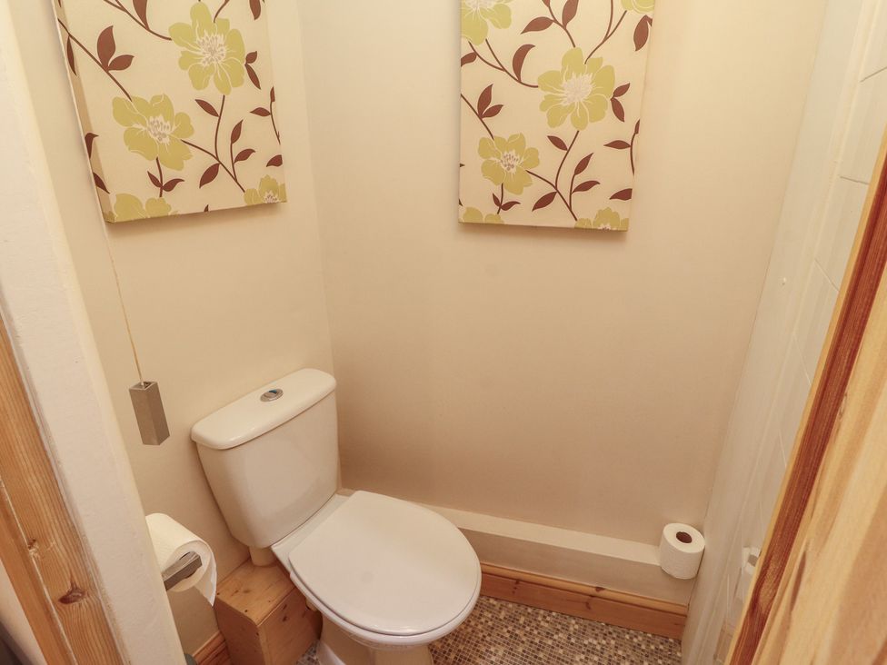 A bathroom with a toilet in The Haven Heysham