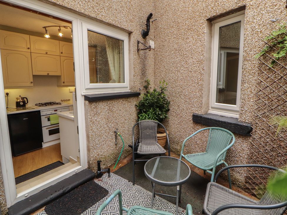 A kitchen and outdoor patio area at The Haven in Heysham