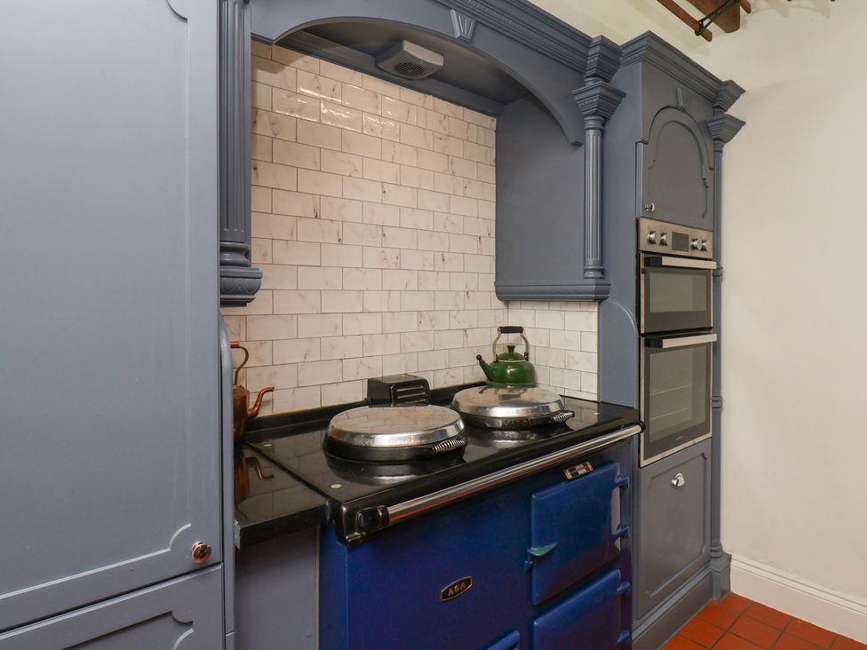 A kitchen with a stove and oven at Reighton House near Filey