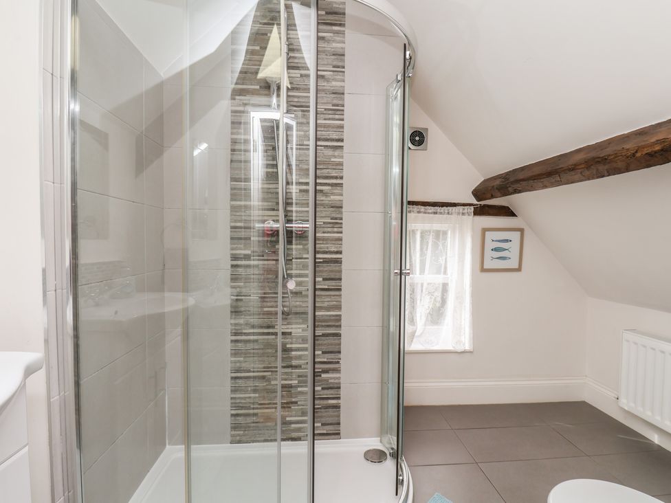 A shower enclosure in a bathroom at Reighton House Reighton near Filey
