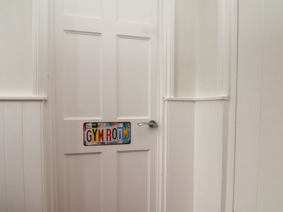 A door with a gym sign at Reighton House in Reighton near Filey