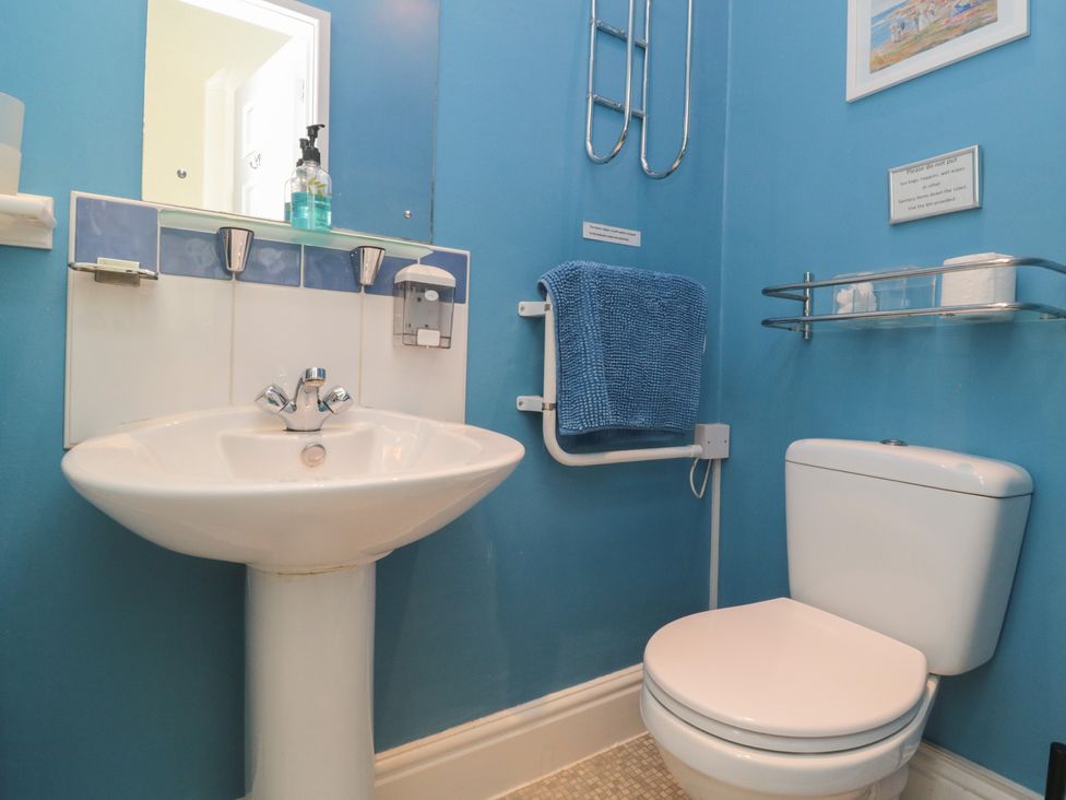 A bathroom with a sink and toilet at Meltham Guest House Scarborough