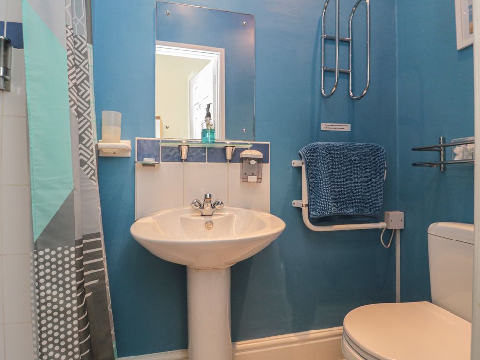 A bathroom with a sink and toilet at Meltham Guest House Scarborough